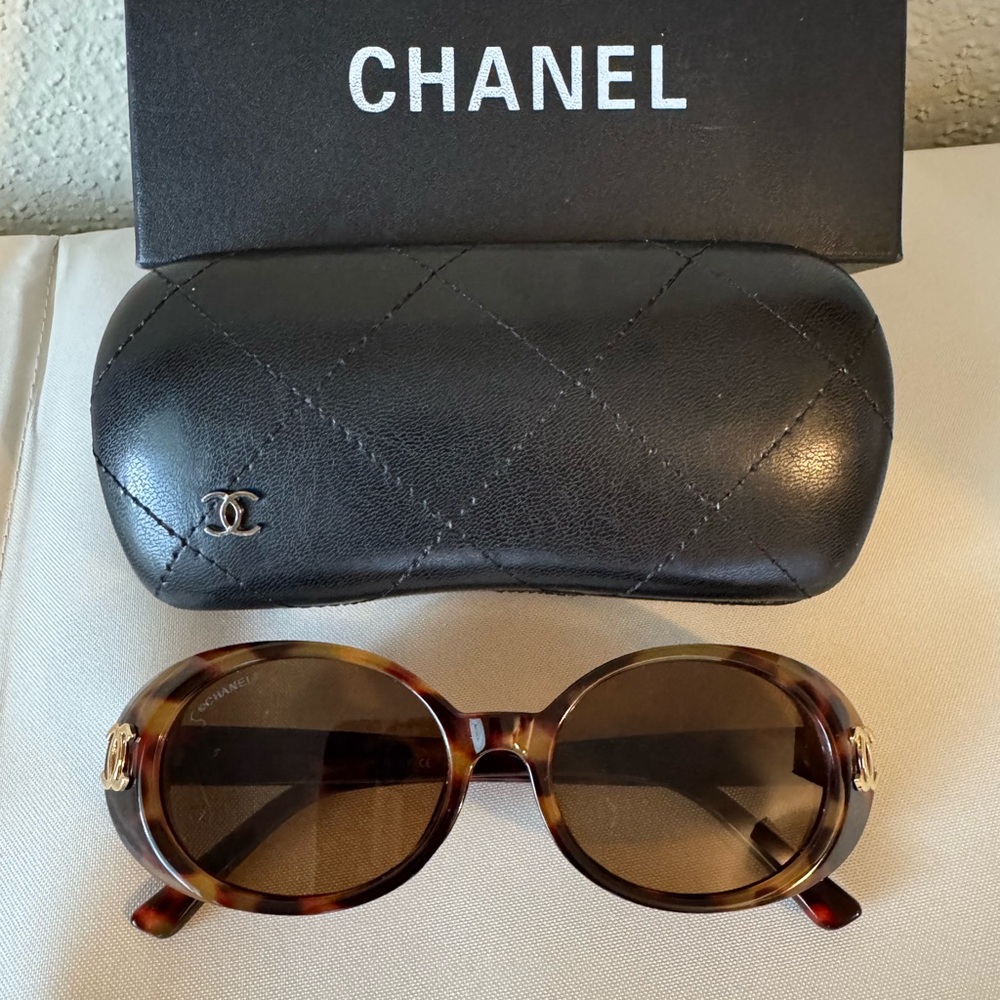 CHANEL Brown Sunglasses with Iconic Logo and Tinted Lenses